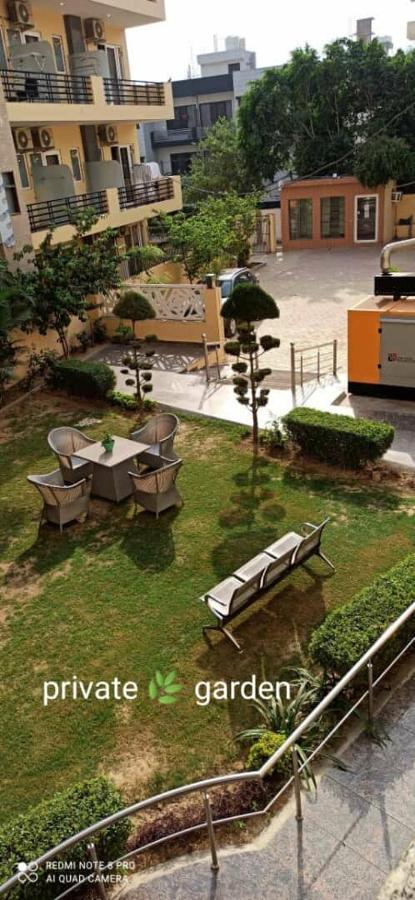 Oyo 74401 Aster Garden Suites Gurgaon Exterior photo